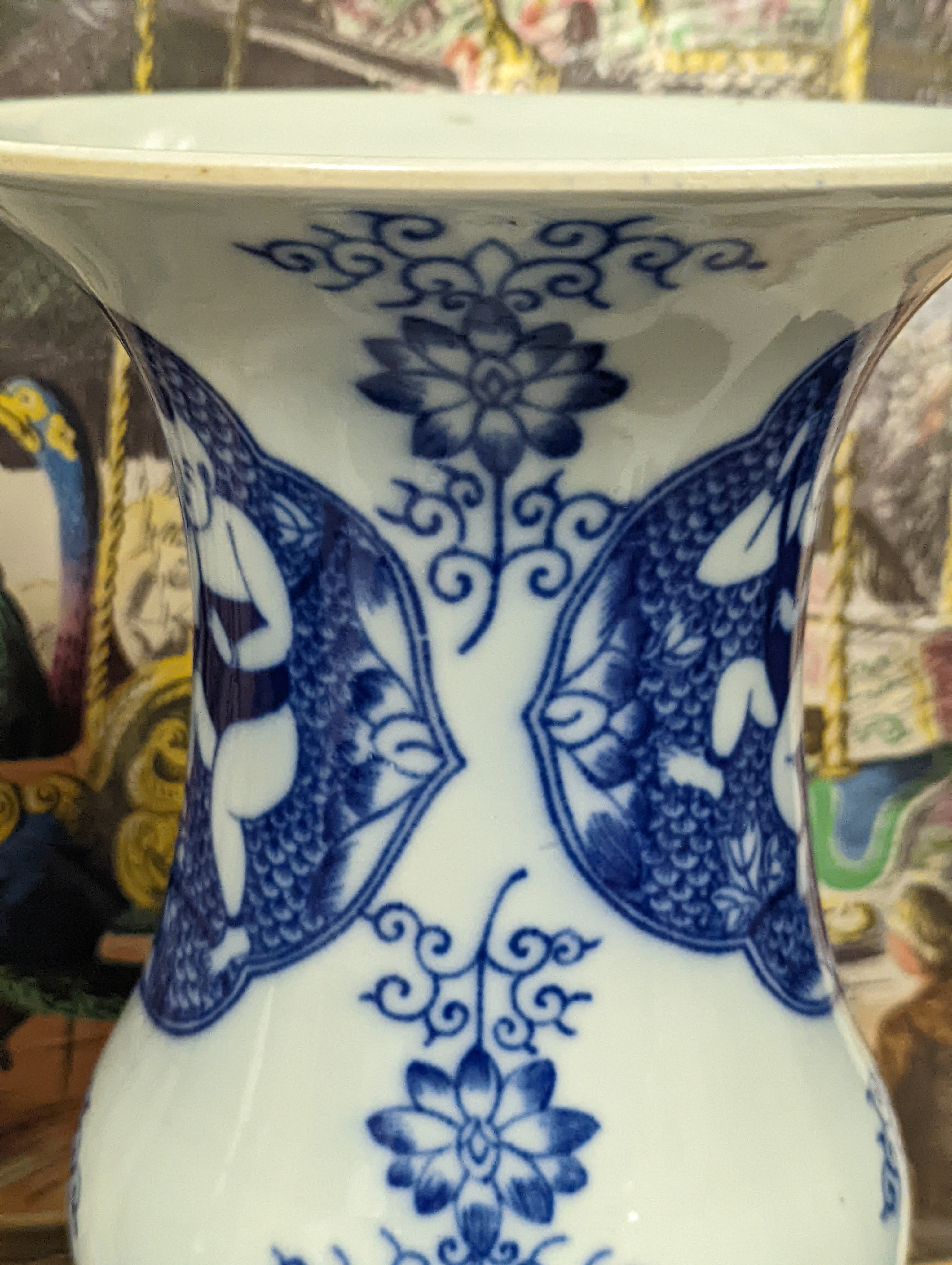 A pair of Chinese blue and white vases on stands and 6 further wood stands. Vases 35cm